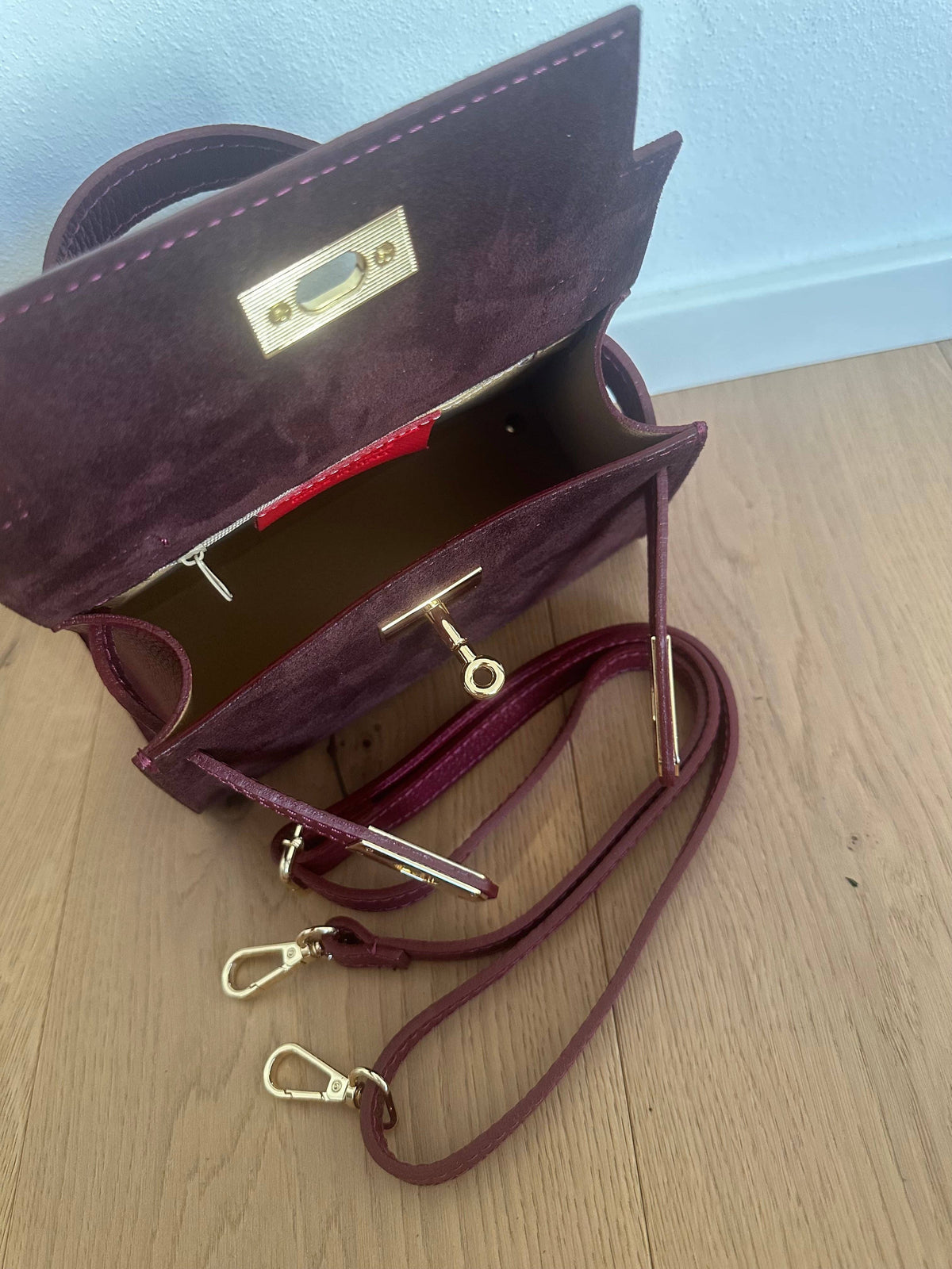 Mini K Suede, liten håndveske i semsket skinn