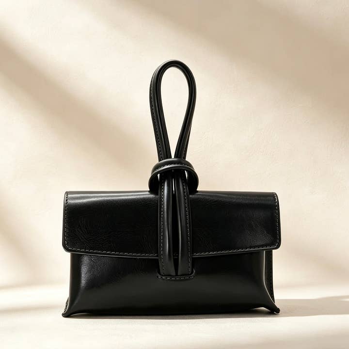 Togo Leather Handbag | Woven Knot Closure | Adjustable Strap | Handcrafted in Italy